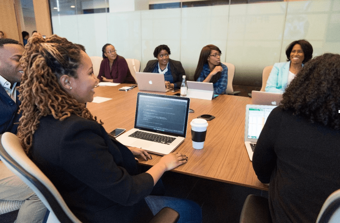 Whitley Neal Team in meeting room